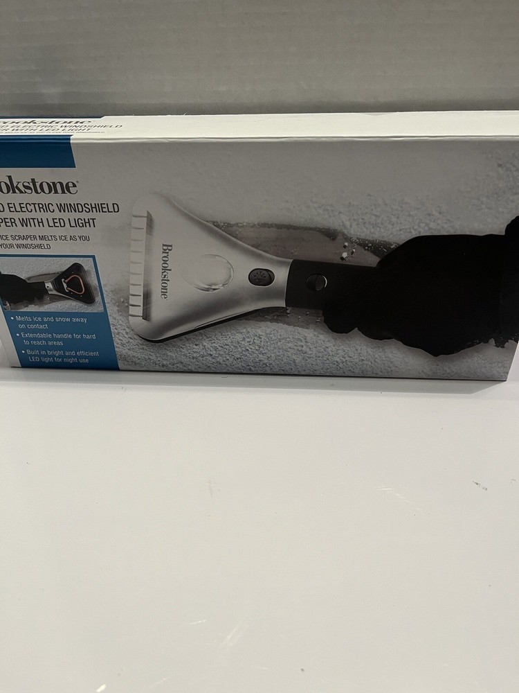 Brookstone heated electric windshield scraper with Led light Used