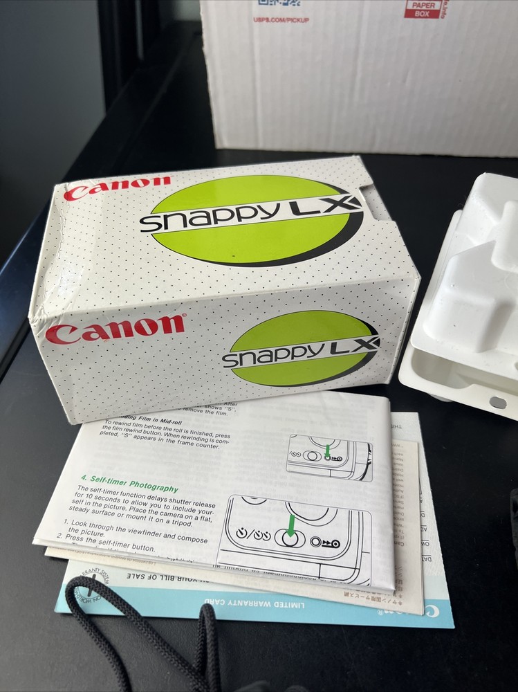 Canon Snappy LX Camera With Box Inserts And Carry Case