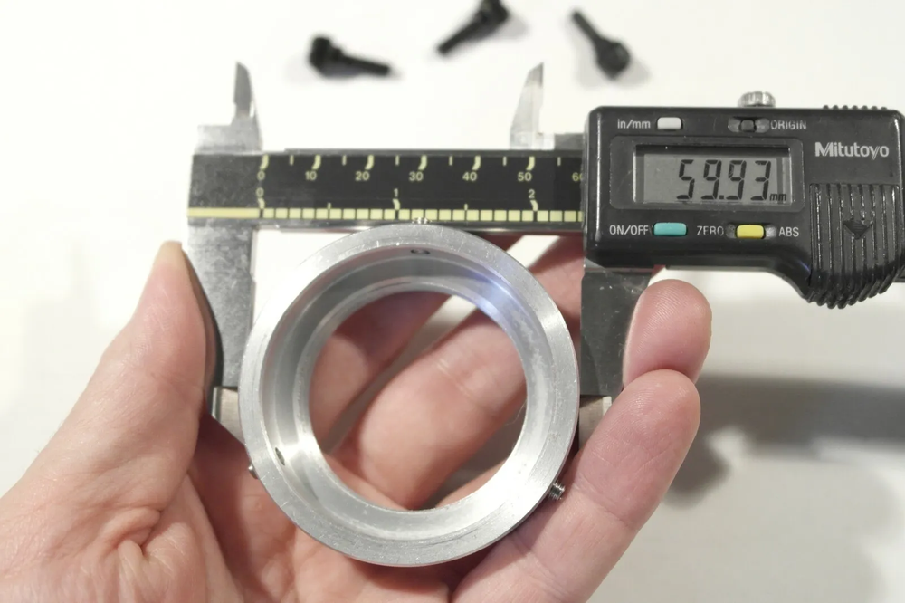Custom T mount female adapter and lens holder for digiscoping microscopy