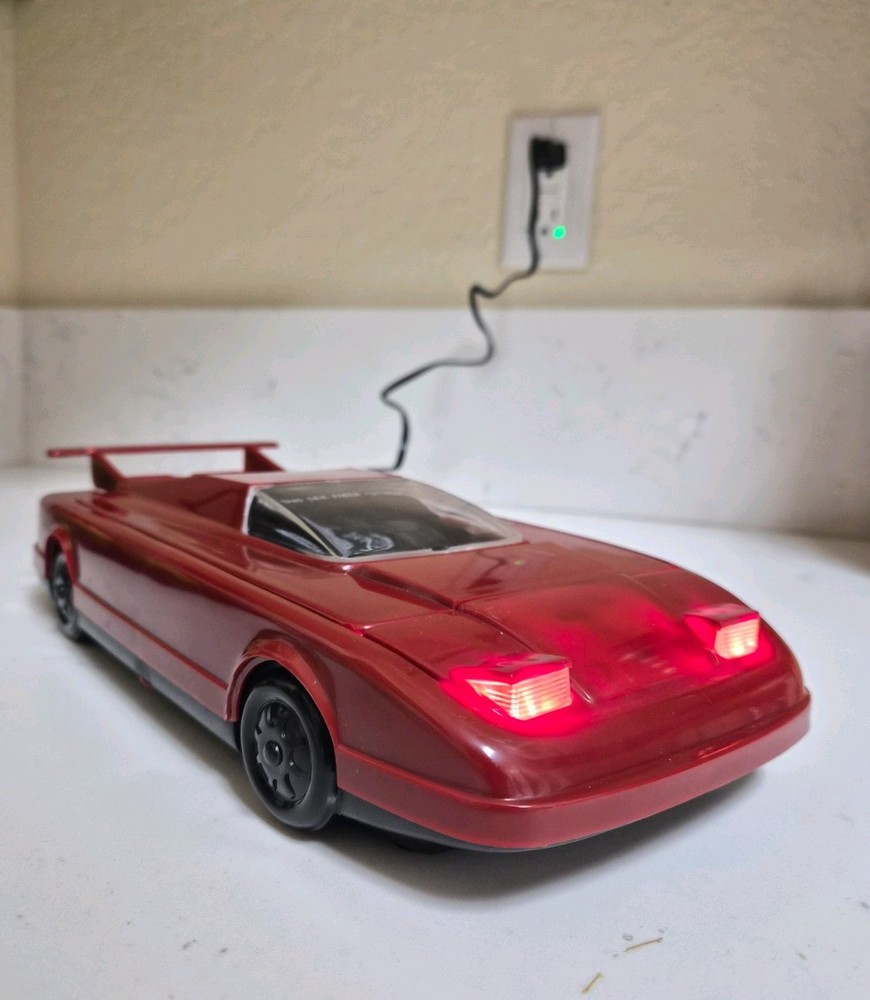 Vintage Red Car Cassette Rewinder. Electronics with Working Lights