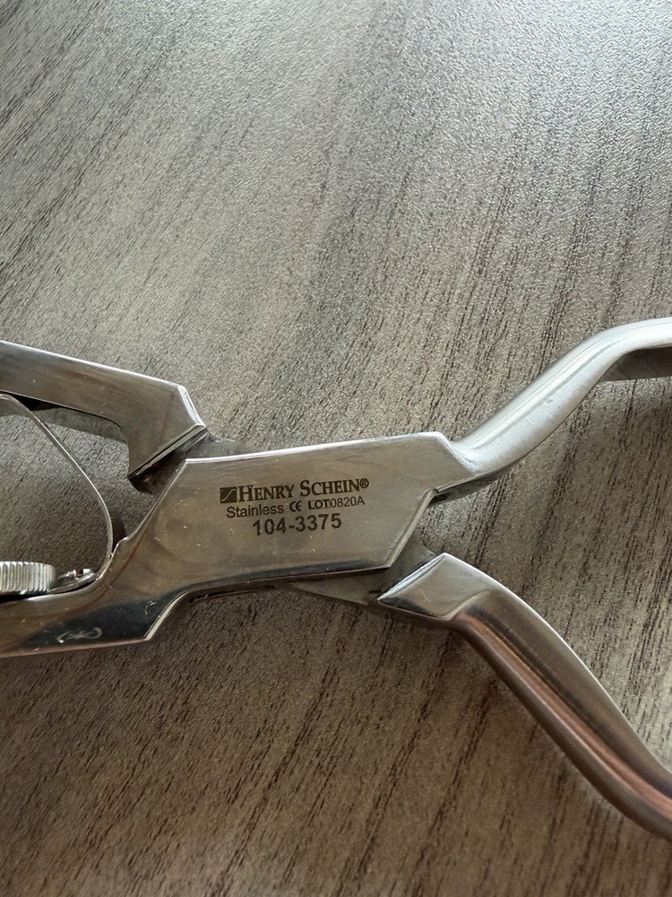Henry Schein Rubber Dam Hole Punch
