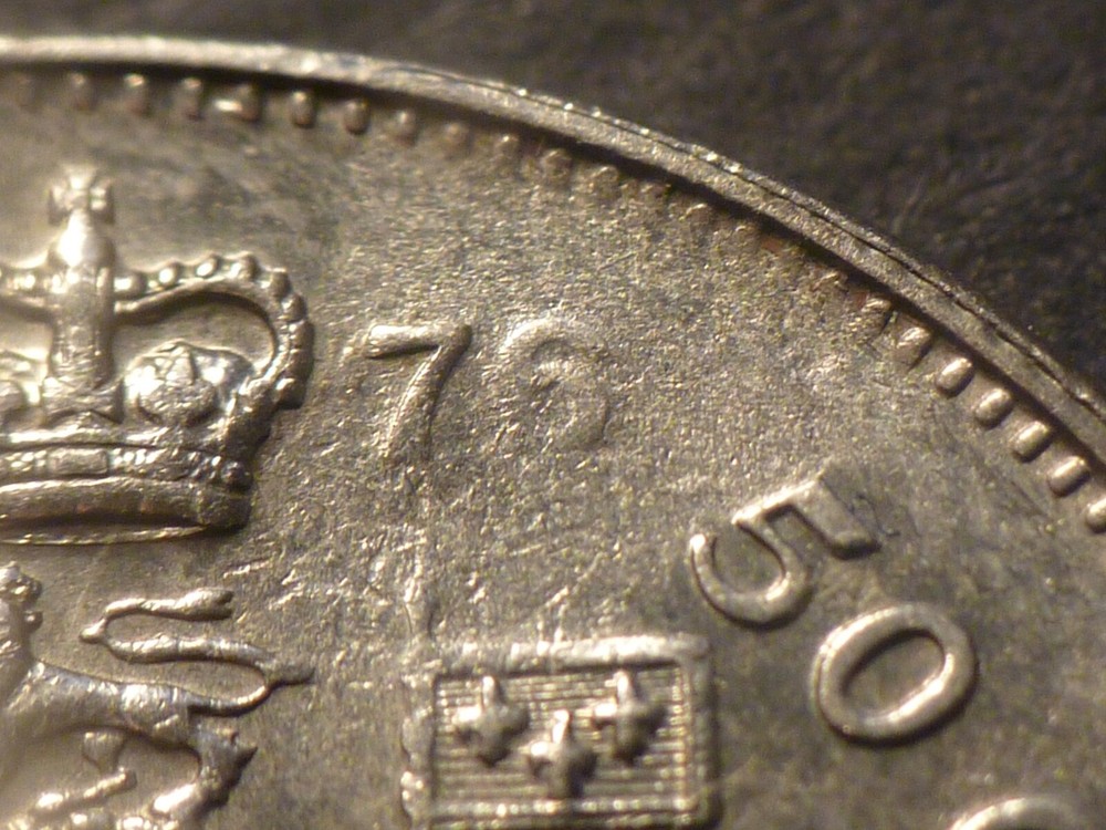 Canada BU 50c 1976, with larger strike-through error