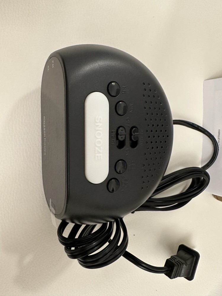 Amazon Basics Small Digital Oval Alarm Clock with LED Display, Nightlight & Batt