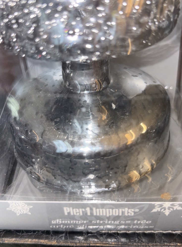 Pier 1 Imports 10 inch Lighted silver cone shaped tree- timer glimmer strings