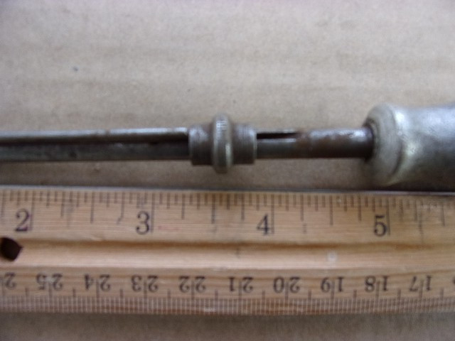 vintage flathead holding screwdriver cast handle