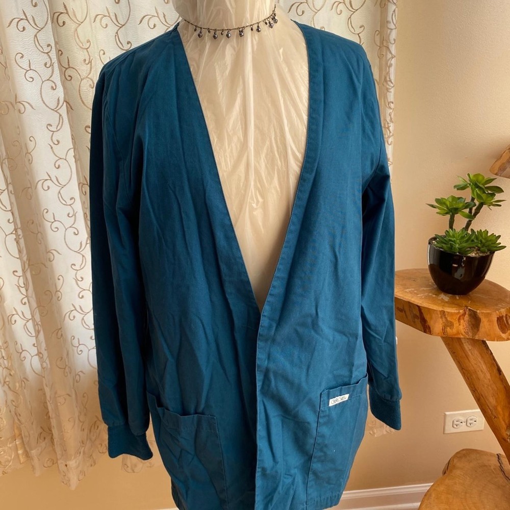 Woman's Teal color scrub Jacket Size S