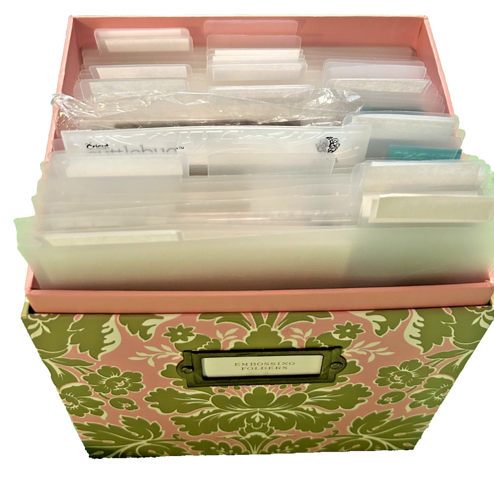Anna Griffin Embossing Box + 2 sets from Cuttlebug. 50 embossers can fit.