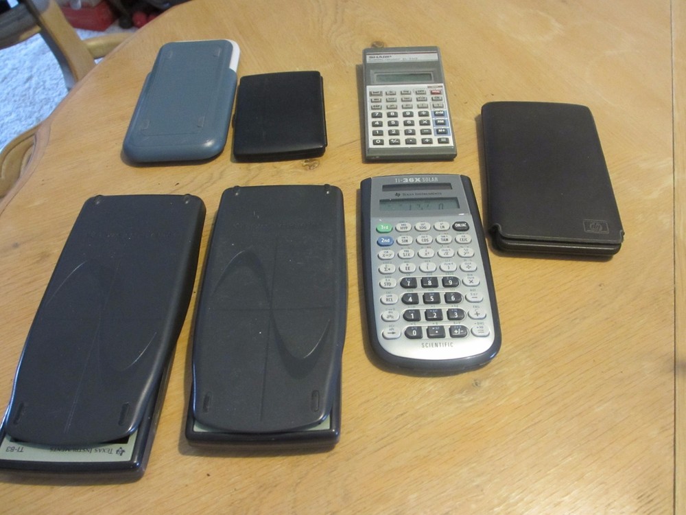 7 Calculators - Scientific - HP - Sharp - Texas Instruments - TI . quantity 7