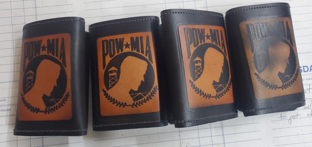 TRI FOLD LEATHER WALLET w/POW*MIA emossed on it