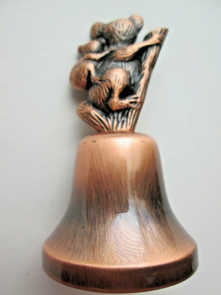 Bells (2) copper finish & bisque finish featuring Koala + stickers no chips