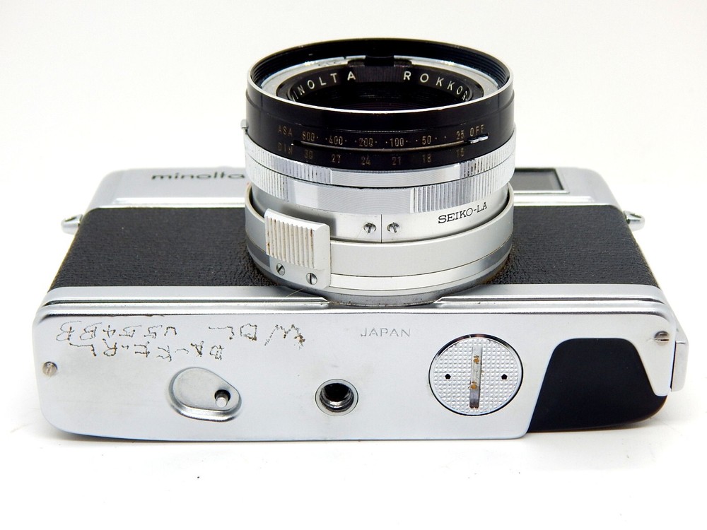 Minolta Hi-Matic 7s with ½ Case & Manual