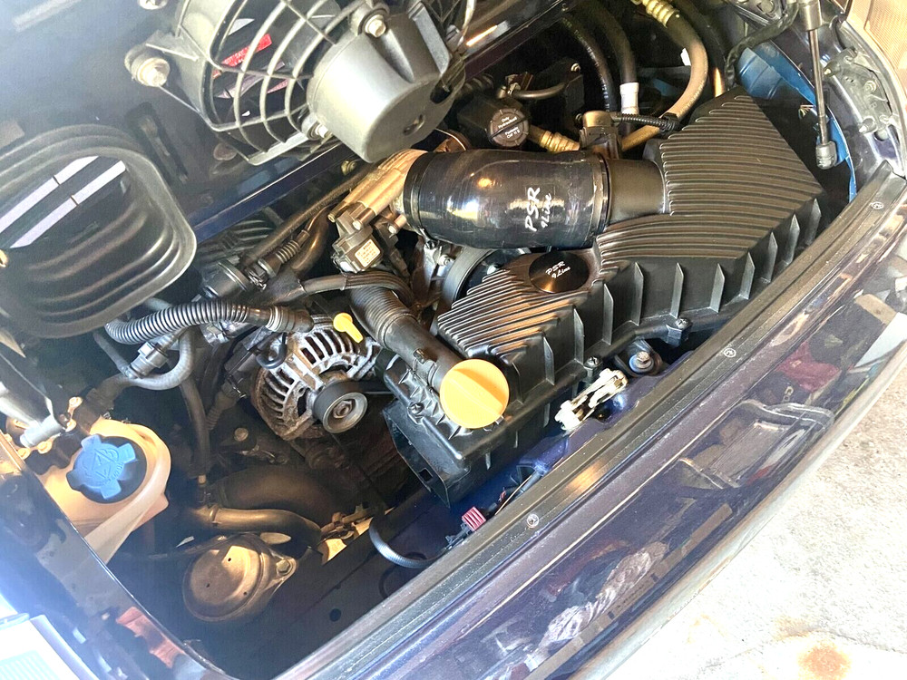 Porsche 996 Resonator Delete Air Box Modification with Blue Induction Pipe Plug.