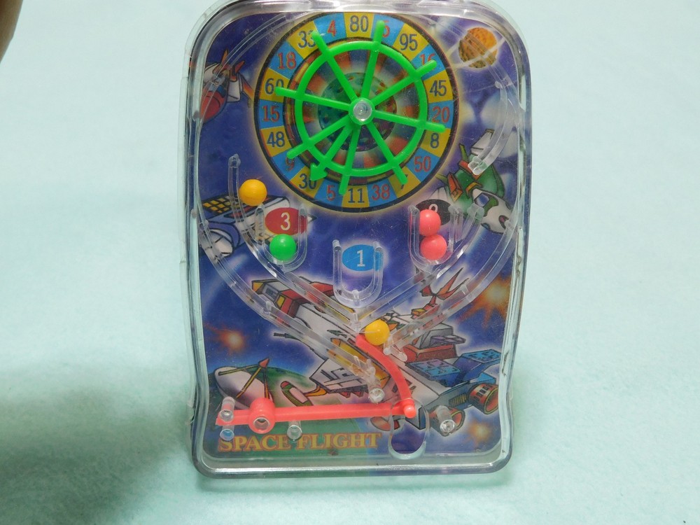 Vintahe Plastic Space Flight 5" Hand Held Pinball Type Game. Works Well