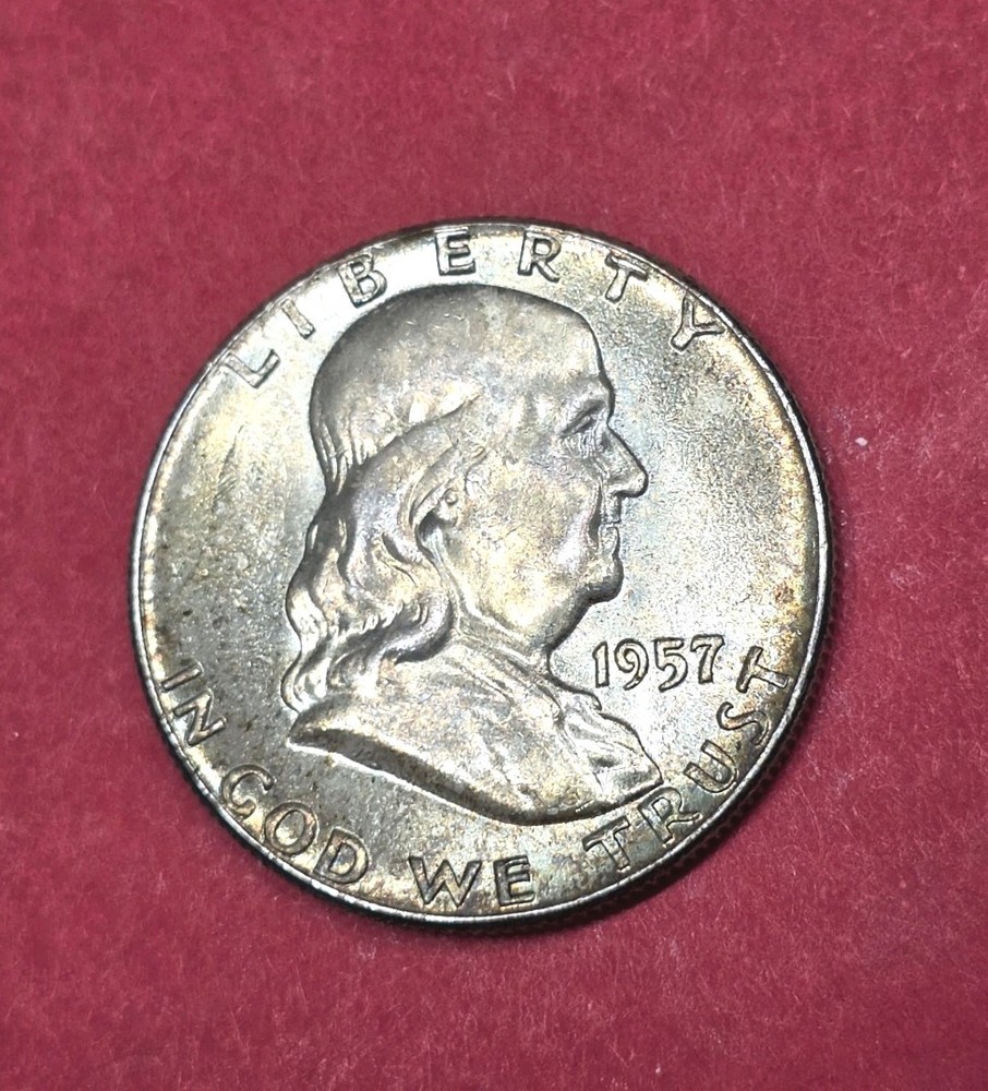 1957 Franklin Half Dollar Nicely Toned, Full Bell Lines.