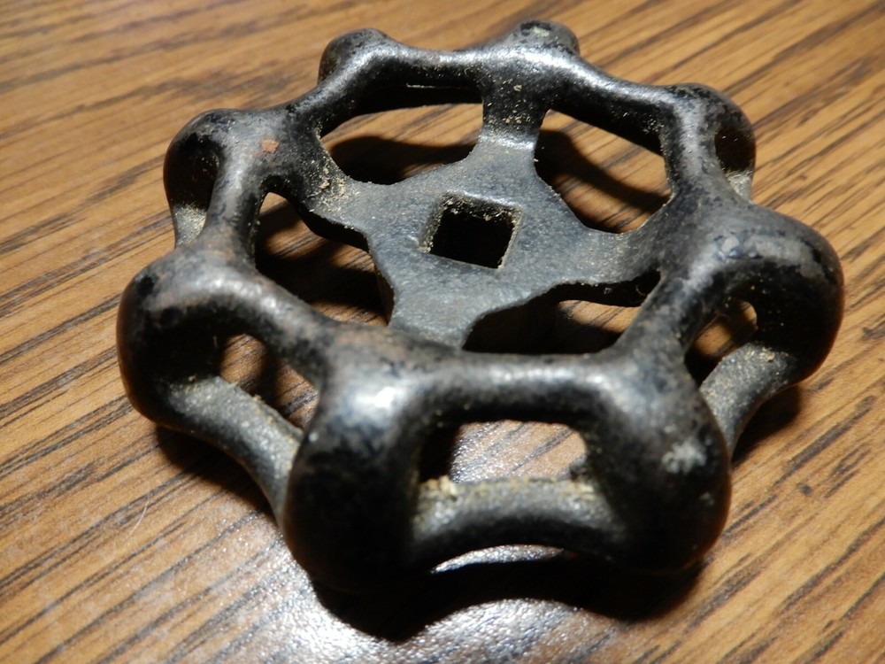 VINTAGE BLACK CAST IRON HANDLE APPROX 2 3/4" WIDE