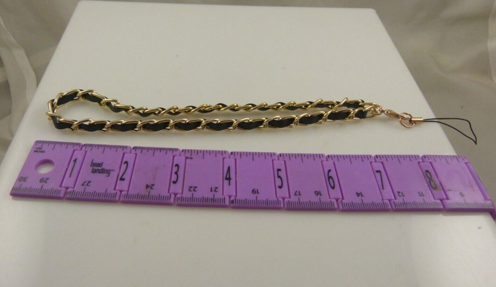 cell phone strap for phone or case black and gold.