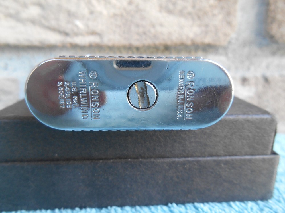 Vintage Ronson WHIRLWIND CHROME CIGARETTE LIGHTER. ETCHED 14TH CENTURY SHIELDS