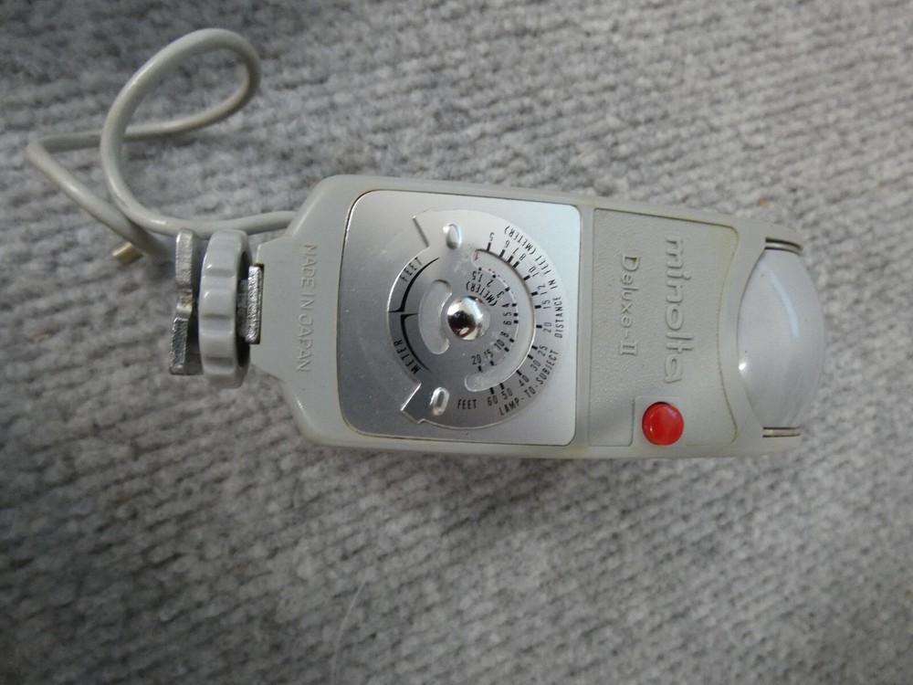 MINOLTA DELUXE II FLASH BULB FAN