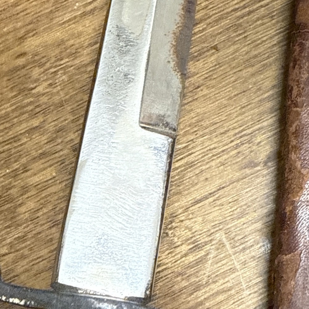 A GERMAN SOLINGEN DAGGER WITH ENGRAVED BLADE