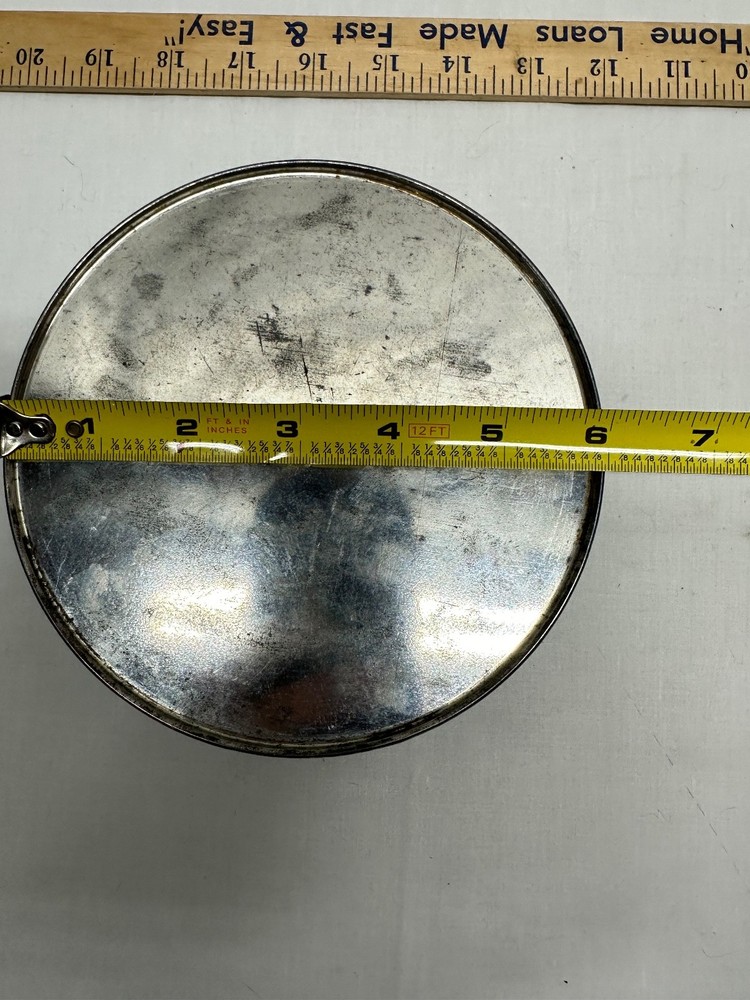 D. E. Wolfgang Candy Tin - 6 inch round