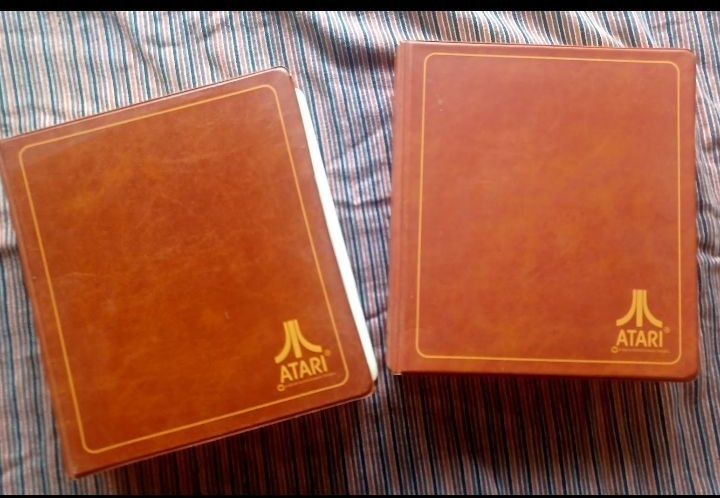 Vintage Atari 2600 Game lot with Atari Original storage cases, untested