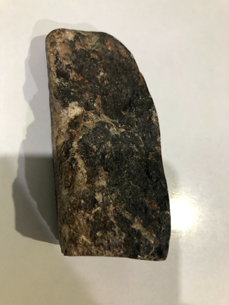 Carved Black/Brown Stone Head - 9.5 cm