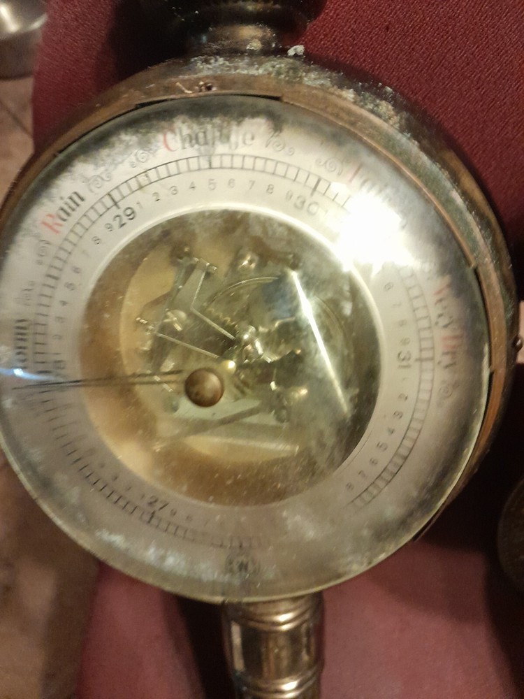 A German Brass-Mounted Clock and Barometer
