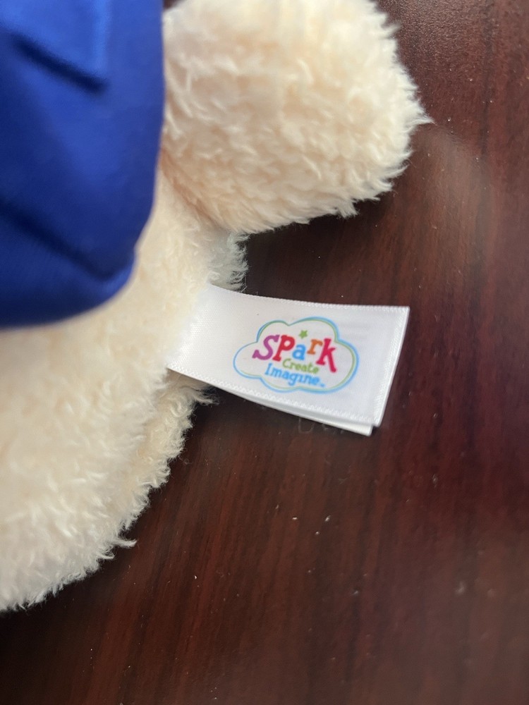 Spark create imagine, interactive learning, bear sings And Lights Up.