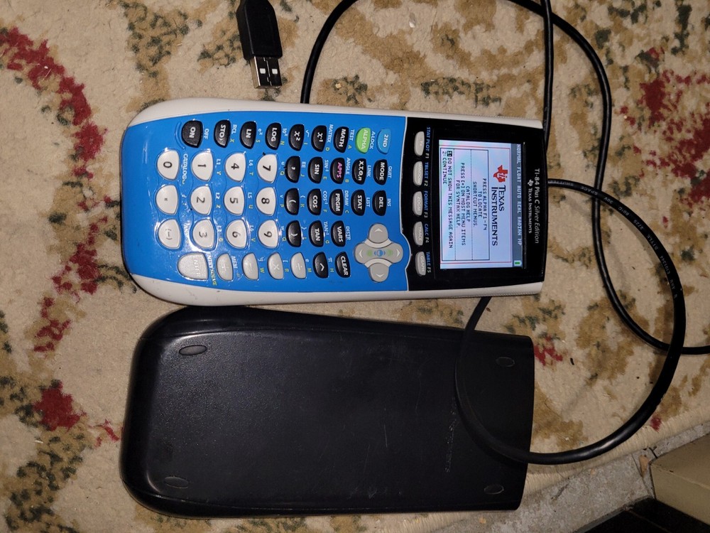 Texas Instruments TI-84 Plus C Silver Edition Handheld Graphing Calculator used