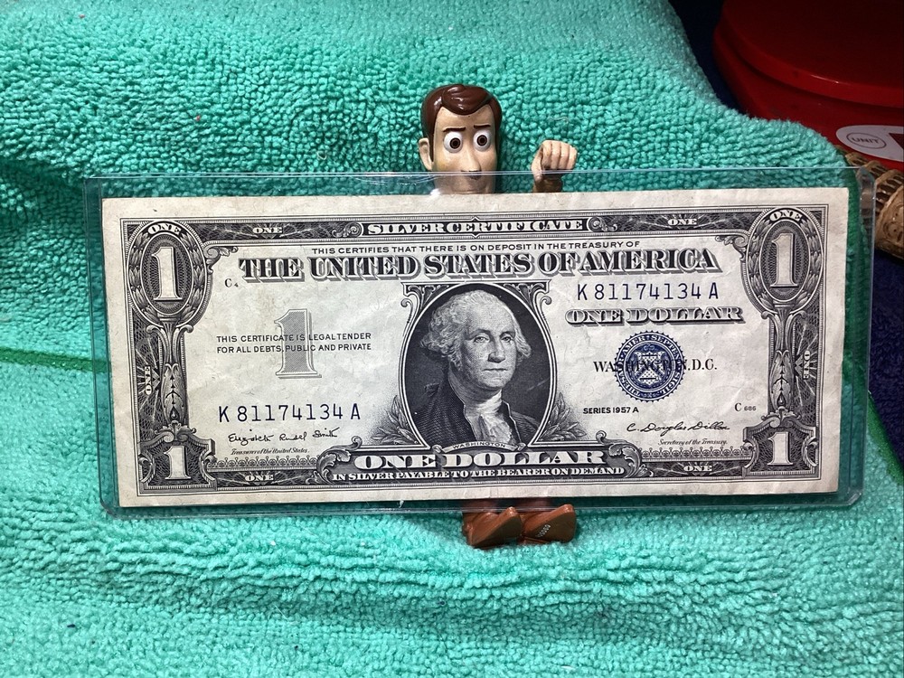 1957 A SILVER CERTIFICATE EF/AU in RIDIG HOLDER