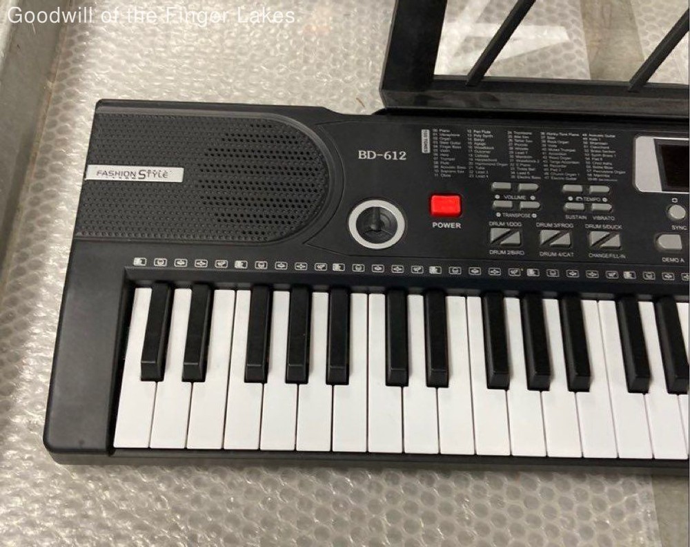 Unbranded 61Keys Electronic Keyboard Powers ON