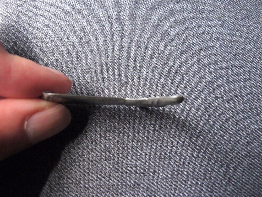 Antique silvered tin cowboy boot pin brooch