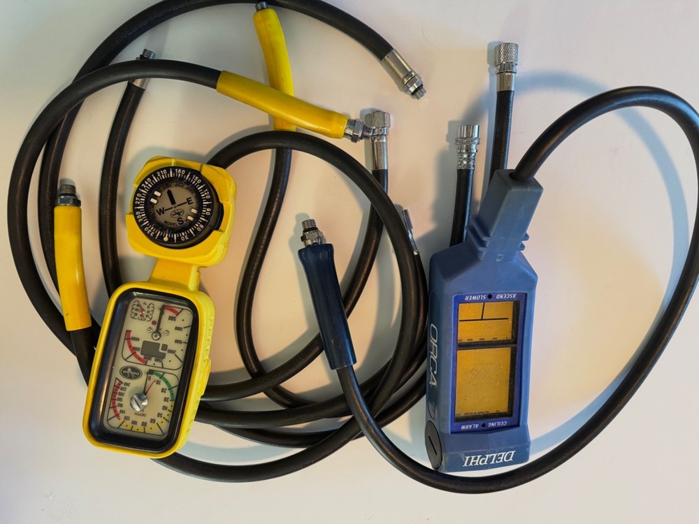 Vintage Scuba Computers with LP and HP hoses