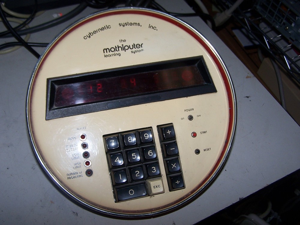 MATHIPUTER LEARNING SYSTEM CYBERNETIC SYSTEMS INC - Red, powers on, Works