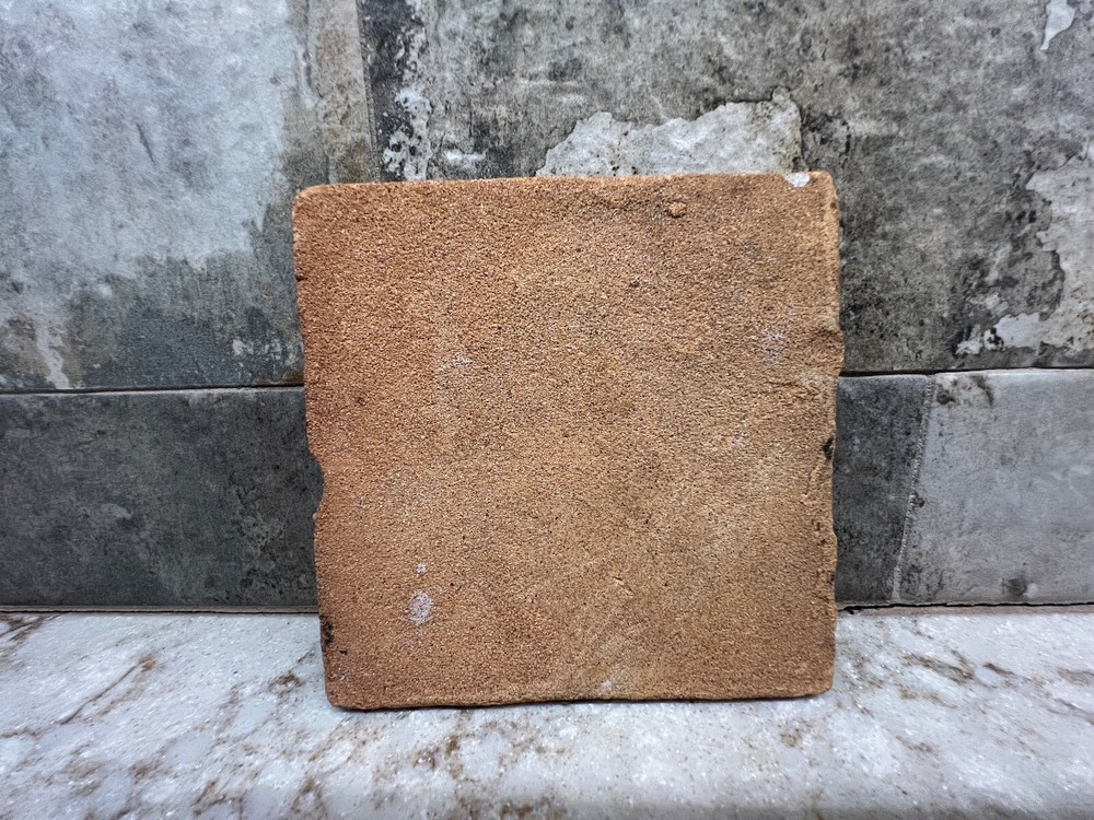 Hand Made Pottery Man With Fish Tile