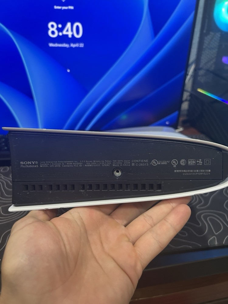 Sony PlayStation 5 Console with Razer Wolverine controller