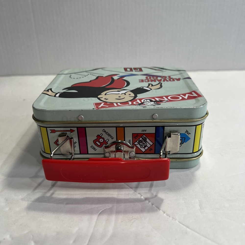 2000 HASBRO MINI MONOPOLY "ADVANCE TO GO" TIN CARRYING CASE