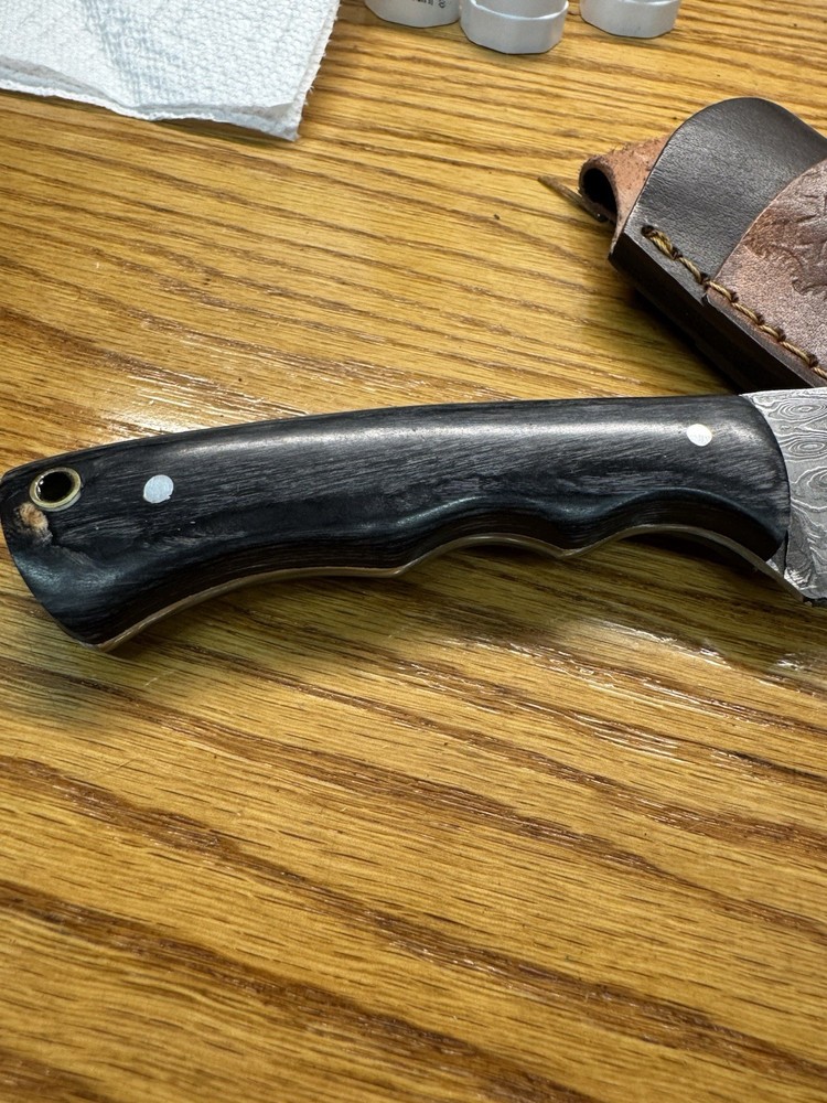 Damascus steel knife with sheath