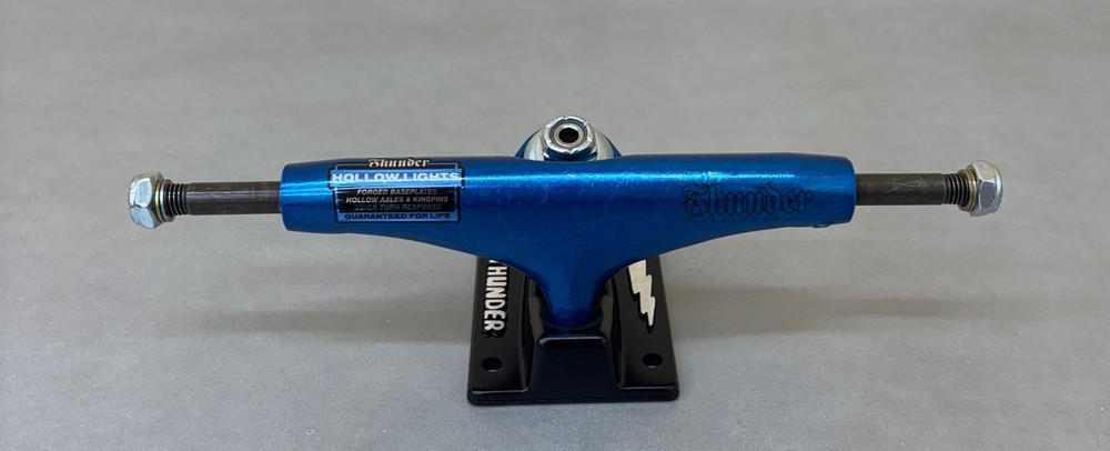 (QTY:1) Thunder Trucks Hollow Metallic Script Anodized Blue Trucks 147
