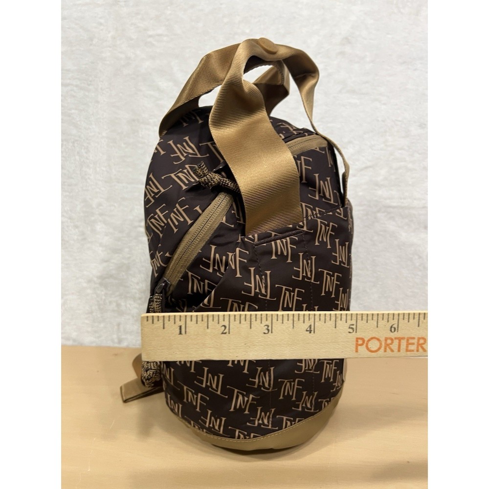 The North Face Never Stop Mini Backpack 5L Brown Tan Monogram NF0A81DV