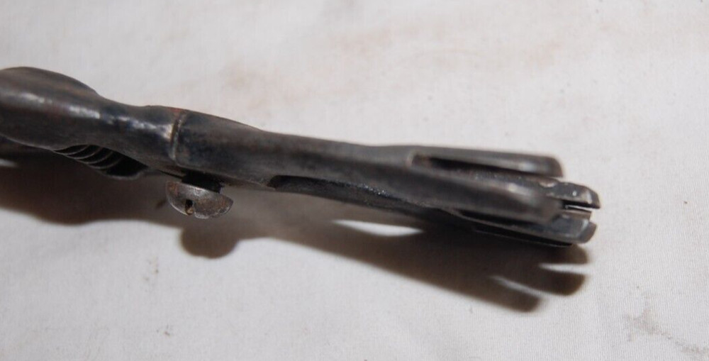 Unusal Antique Spring Loaded Iron Crimper ?