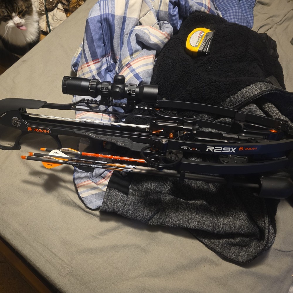 ravin r29x with bow case and some lighted knocks