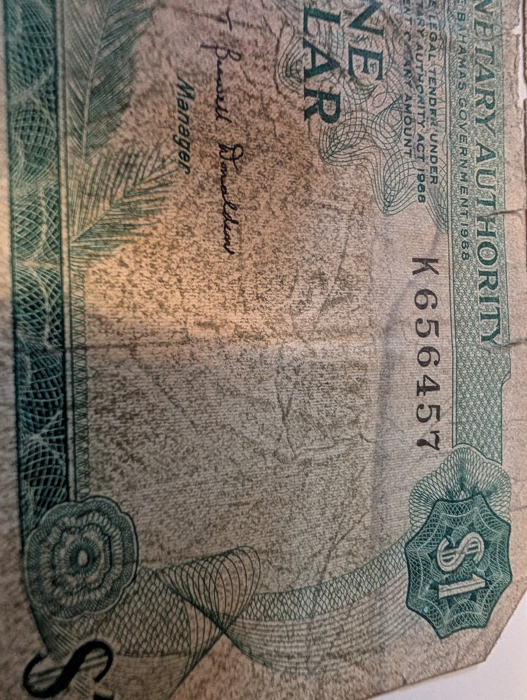 $2 Canadian Note. $1 Bahamas Note