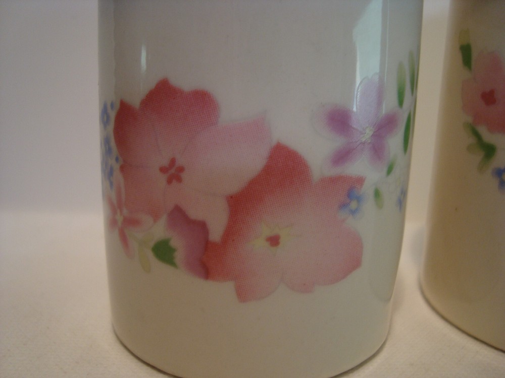 Large white porcelain floral pattern salt & pepper shaker set.
