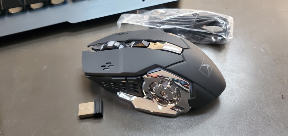 Wireless Gaming Keyboard and Mouse w/Rainbow Backlit Rechargeable Metal Panel.