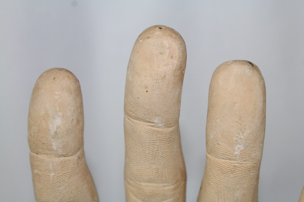 Plaster bookends Reading Hands