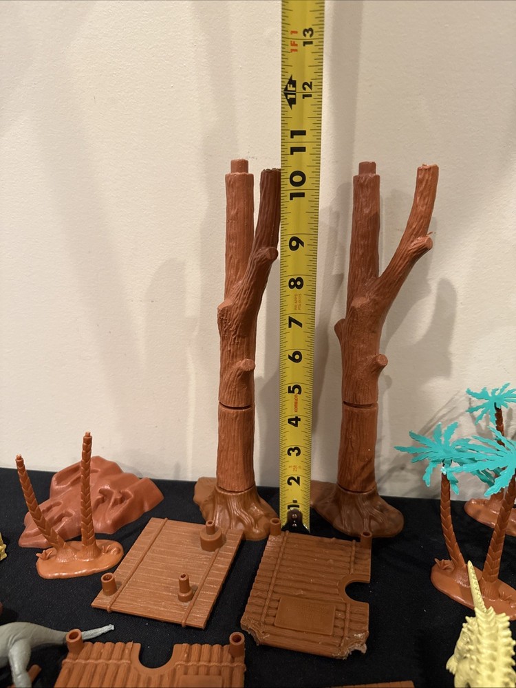 Dinosaur Approximately 37 Figures Plus Trees ( Missing Parts) READ