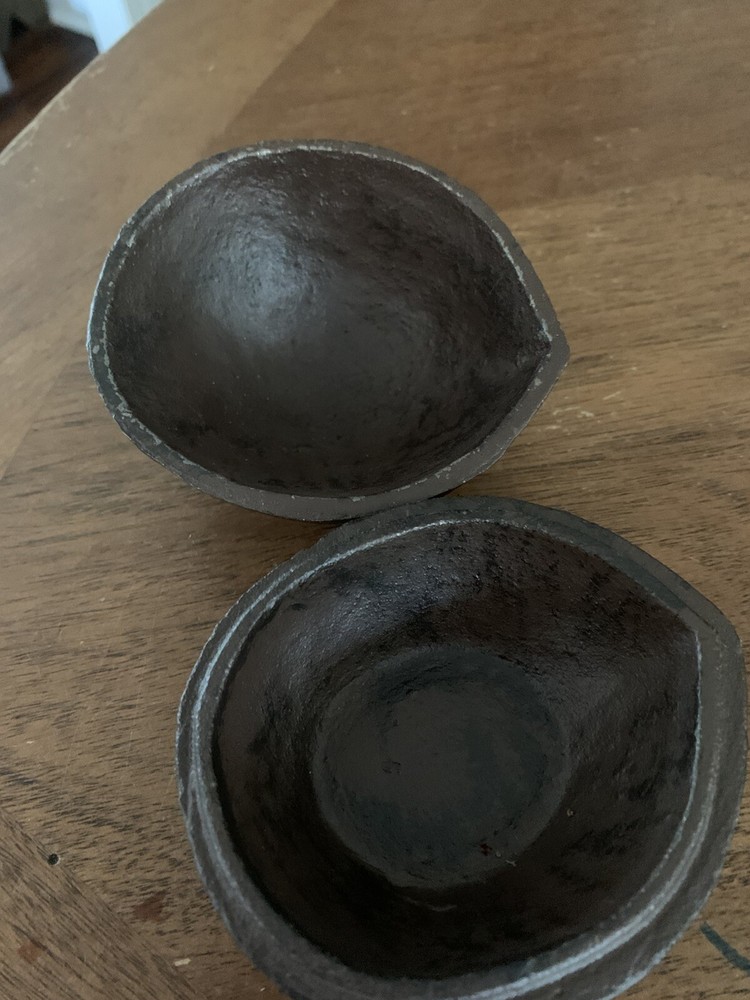 cast iron walnut shaped paper weight brown