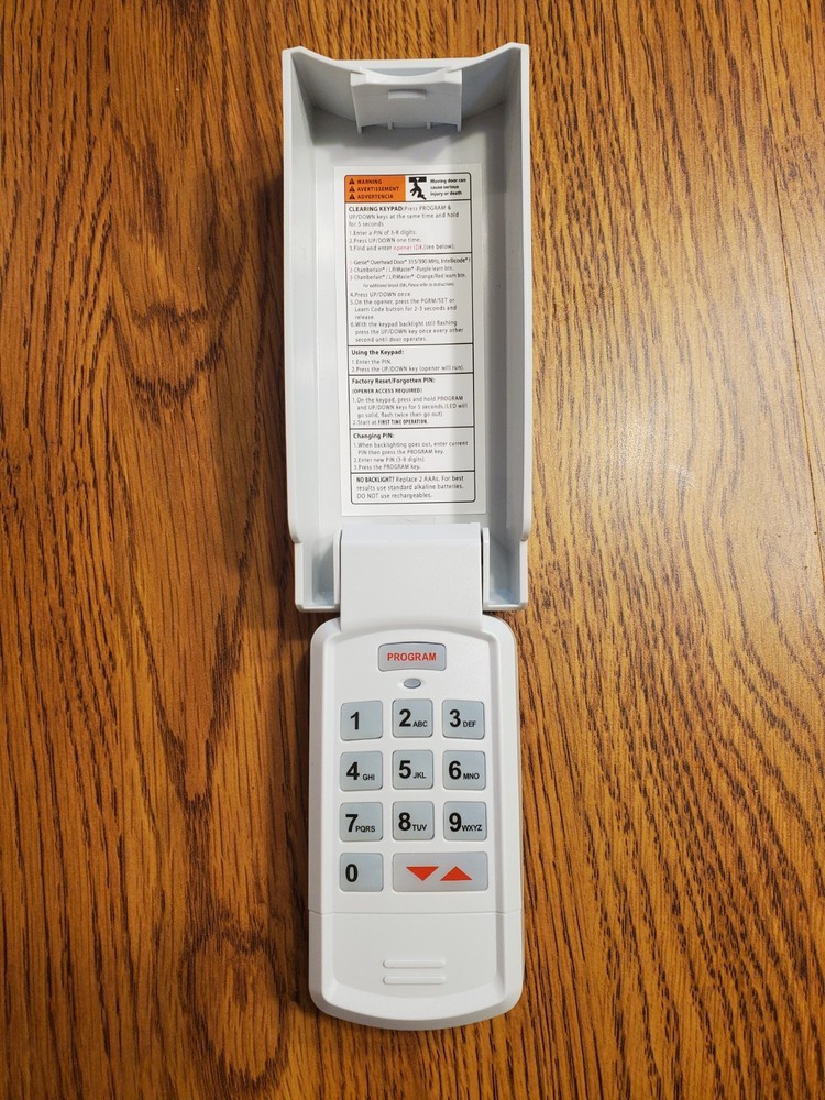 Universal wireless keypad garage entry system