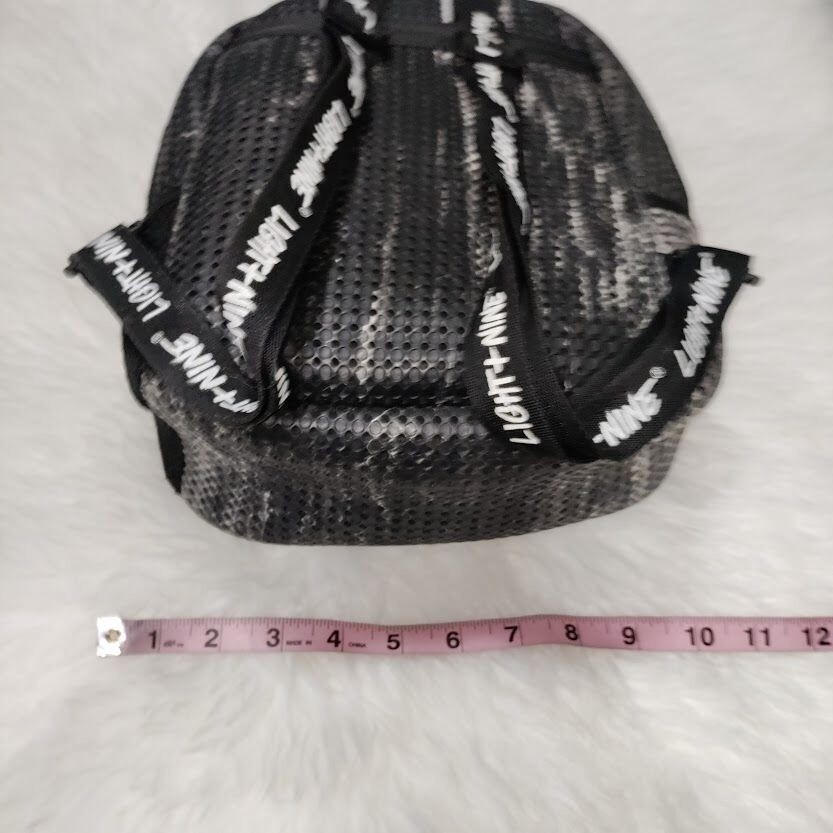 Light + Nine Little Mini Perforated Black and White Kids Backpack